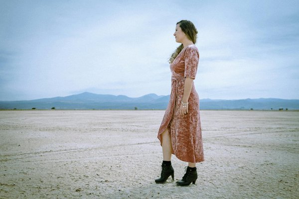 How to style a velvet dress for a winter evening out?